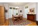 Elegant dining room with hardwood floors, shuttered windows, and classic furnishings, creating a warm atmosphere at 3937 Bentley Brook Dr, Raleigh, NC 27612