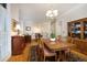 Dining room with hardwood floors and elegant decor, perfect for entertaining at 3937 Bentley Brook Dr, Raleigh, NC 27612