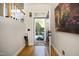 Bright foyer with hardwood floors and view of landscaped front yard at 3937 Bentley Brook Dr, Raleigh, NC 27612