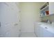 Laundry room with white washer and dryer at 3937 Bentley Brook Dr, Raleigh, NC 27612