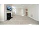 Spacious living room with fireplace and built-in bar at 3937 Bentley Brook Dr, Raleigh, NC 27612