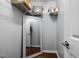 Walk-in closet with adjustable shelving and plenty of storage space at 4002 Rothfield Ln, Raleigh, NC 27616