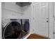 Laundry area features a modern washer and dryer set and plenty of space at 4002 Rothfield Ln, Raleigh, NC 27616