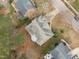 Overhead aerial displays the property's large backyard and neighborhood layout at 401 Acorn Falls Ct, Holly Springs, NC 27540