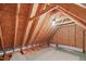 Unfinished attic space ready to be transformed with exposed beams and insulation at 401 Acorn Falls Ct, Holly Springs, NC 27540