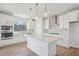 Bright, spacious kitchen with stainless appliances, an island, and sleek countertops at 4724 Cypress Tree Ln, Raleigh, NC 27612