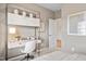 Relaxing bedroom features a built-in desk space with overhead storage and plenty of light at 4888 Pioneer Dr, Sanford, NC 27330
