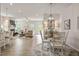 Open-concept living space featuring a dining area, living room with fireplace, and lots of natural light at 4888 Pioneer Dr, Sanford, NC 27330
