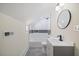 Cozy bathroom with slate tile, tiled shower-tub, modern vanity and fixtures at 512 S 4Th St, Smithfield, NC 27577