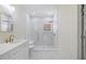 A luxurious bathroom offers a stylish walk-in shower with marble tiling and modern fixtures at 512 S 4Th St, Smithfield, NC 27577