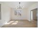 Bright dining room with hardwood floors and natural light from two windows at 512 S 4Th St, Smithfield, NC 27577