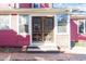 Welcoming front porch with brick steps and a unique wooden screen door at 516 N Bloodworth St, Raleigh, NC 27604
