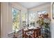 Bright office space featuring three windows, hardwood floors, beadboard walls, and ample natural light at 516 N Bloodworth St, Raleigh, NC 27604