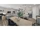 Open-concept dining area connecting the kitchen and living room for seamless entertaining at 517 Providence Springs Ln, Fuquay Varina, NC 27526
