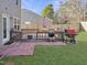 Outdoor area featuring a deck, grill, and patio setup, ideal for entertaining and relaxing at 5321 Carnelian Dr, Raleigh, NC 27610