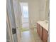Bathroom with single sink vanity and tile flooring at 5321 Carnelian Dr, Raleigh, NC 27610