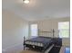Bedroom with black metal bed frame and dresser at 5321 Carnelian Dr, Raleigh, NC 27610