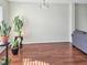 Bright living room with hardwood floors, neutral walls, and ample natural light at 5321 Carnelian Dr, Raleigh, NC 27610