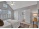 This bedroom features a vaulted ceiling, neutral walls, and carpet at 5806 Whispering Meadow Ln, Durham, NC 27712