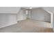 This bedroom includes carpeted floors, a ceiling fan, and a double-door closet for storage at 5806 Whispering Meadow Ln, Durham, NC 27712