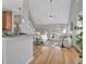 Bright and airy living room with hardwood floors, high ceilings, and a cozy fireplace at 5806 Whispering Meadow Ln, Durham, NC 27712