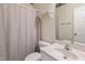 Bathroom with a single sink and vanity, toilet, and shower with a curtain at 613 Hamecon Place, Cedar Grove, NC 27231
