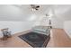 Bright bonus room features wood floors, two ceiling fans, skylight, and ample space at 613 Hamecon Place, Cedar Grove, NC 27231