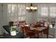 Bright dining area with natural light, table, chairs, and access to additional living spaces at 622 Ives Ct # 622, Chapel Hill, NC 27514