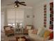 Cozy living room with comfortable seating, area rug, ceiling fan, and natural light from the window at 622 Ives Ct # 622, Chapel Hill, NC 27514