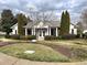 Charming community clubhouse with well-maintained landscaping and inviting entrance at 622 Village Lake Drive, Mebane, NC 27302