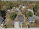 Charming home with a spacious lot and mature trees, providing a serene and private setting in a quiet neighborhood at 703 Vance St, Henderson, NC 27536