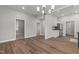 Bright open-concept area with combined kitchen and dining space at 703 Vance St, Henderson, NC 27536