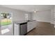 Spacious kitchen island with stainless steel dishwasher and stylish granite countertops at 704 Rhino Bnd, Oxford, NC 27565
