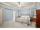 Spacious main bedroom featuring a ceiling fan, and carpet at 7100 Winter Pond Way, Fuquay Varina, NC 27526