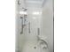 Walk in shower with a built in seat and handheld shower head at 7100 Winter Pond Way, Fuquay Varina, NC 27526