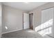 Bright bedroom with neutral paint, carpet and natural light from a window at 838 Waring St, Durham, NC 27704