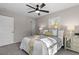 Bedroom with natural light, a ceiling fan and neutral colors at 838 Waring St, Durham, NC 27704