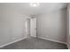 Bedroom with soft carpet and a neutral color scheme at 838 Waring St, Durham, NC 27704