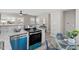 Updated kitchen with stainless steel appliances, modern countertops, and an eat-in dining area at 838 Waring St, Durham, NC 27704