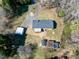 Aerial shot of house revealing a dark shingle roof and buildings at 8604 N Roxboro St, Bahama, NC 27503