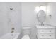 Clean and well-lit, this bathroom has a large shower and vanity at 8604 N Roxboro St, Bahama, NC 27503