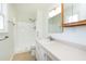 Well-lit bathroom features a walk-in shower and a vanity with storage at 8604 N Roxboro St, Bahama, NC 27503