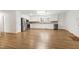 Spacious kitchen with stainless steel appliances and white cabinets at 8604 N Roxboro St, Bahama, NC 27503