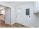 Functional laundry room with a door to the outside and access to kitchen at 8604 N Roxboro St, Bahama, NC 27503