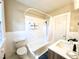 Well lit bathroom featuring a classic shower/tub combination and a modern vanity at 938 Hargrove St, Henderson, NC 27536