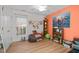Comfortable bedroom with natural light, a ceiling fan, and hardwood floors at 1006 Scotsburg Trl, Hillsborough, NC 27278