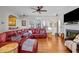Spacious living room with hardwood floors, a fireplace and plenty of natural light at 1006 Scotsburg Trl, Hillsborough, NC 27278