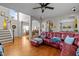 This living room has hardwood floors, an open staircase and plenty of room for entertaining at 1006 Scotsburg Trl, Hillsborough, NC 27278