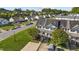 Overhead view of a two-story home with a charming green door and a lush green lawn at 101 Wimbledon Ct, Clayton, NC 27520