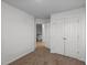 Comfortable bedroom features carpet flooring, a closet and adjoins another room at 101 Wimbledon Ct, Clayton, NC 27520